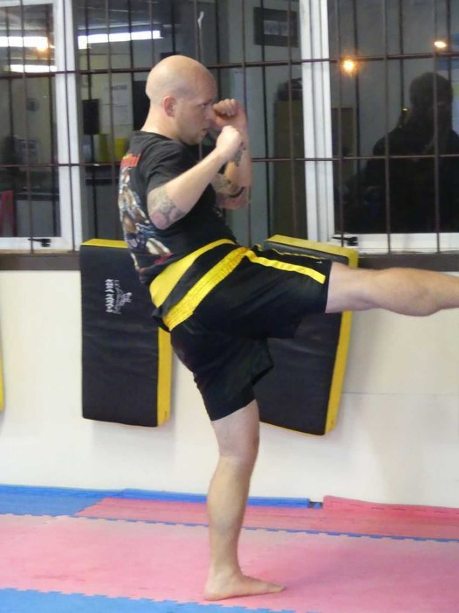An Intense and Fun Workout That Teaches Kickboxing &amp; Self-Defense!